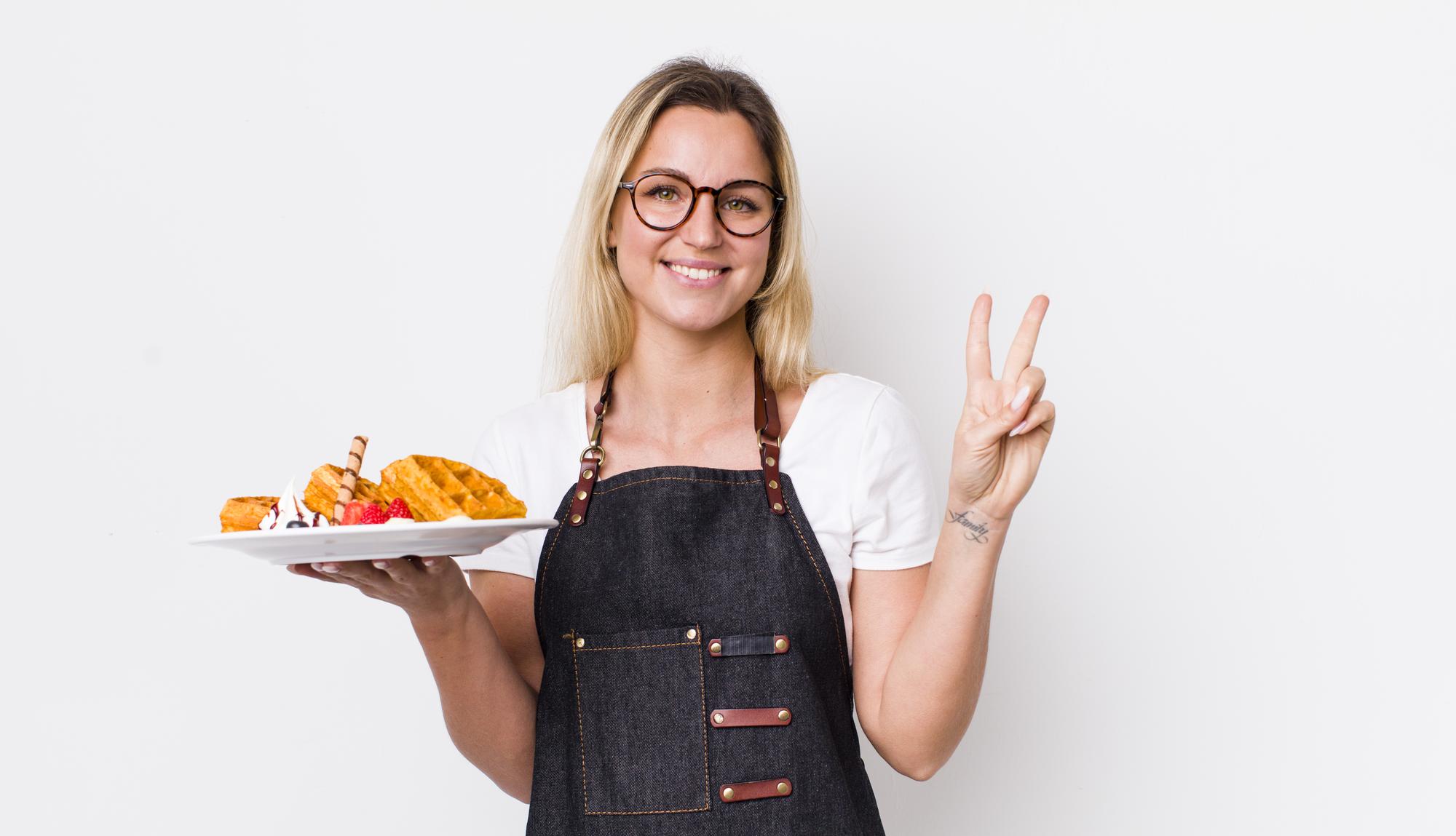 Cook offering plated meal